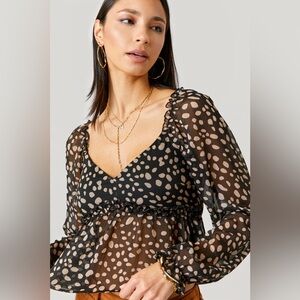 Francesca’s Puff Sleeve Patricia Sheer Animal Print Blouse